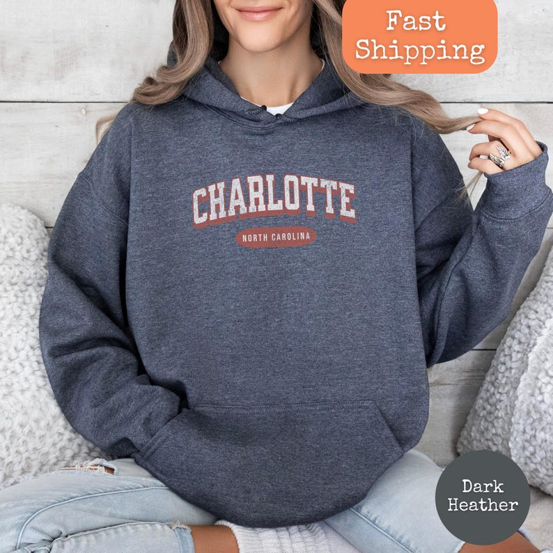 Dark heather gray hoodie with "CHARLOTTE NORTH CAROLINA" text.