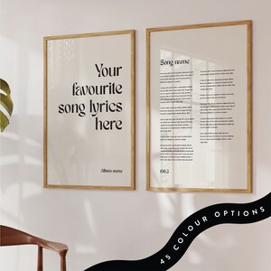 May include: Two framed art prints with song lyrics. One print says "Your favourite song lyrics here" and the other has song lyrics and the year 1965. Both prints are in wooden frames. The text "45 COLOUR OPTIONS" is visible.