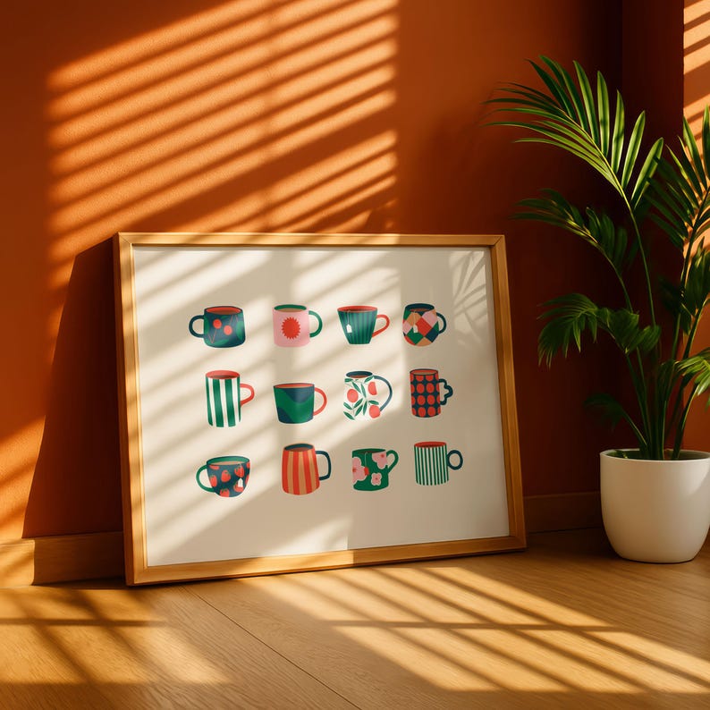 May include: A framed print featuring a collection of twelve colorful mugs with various patterns. The mugs are arranged in three rows of four, showcasing designs with stripes, polka dots, and floral motifs. The artwork is set against a cream background.
