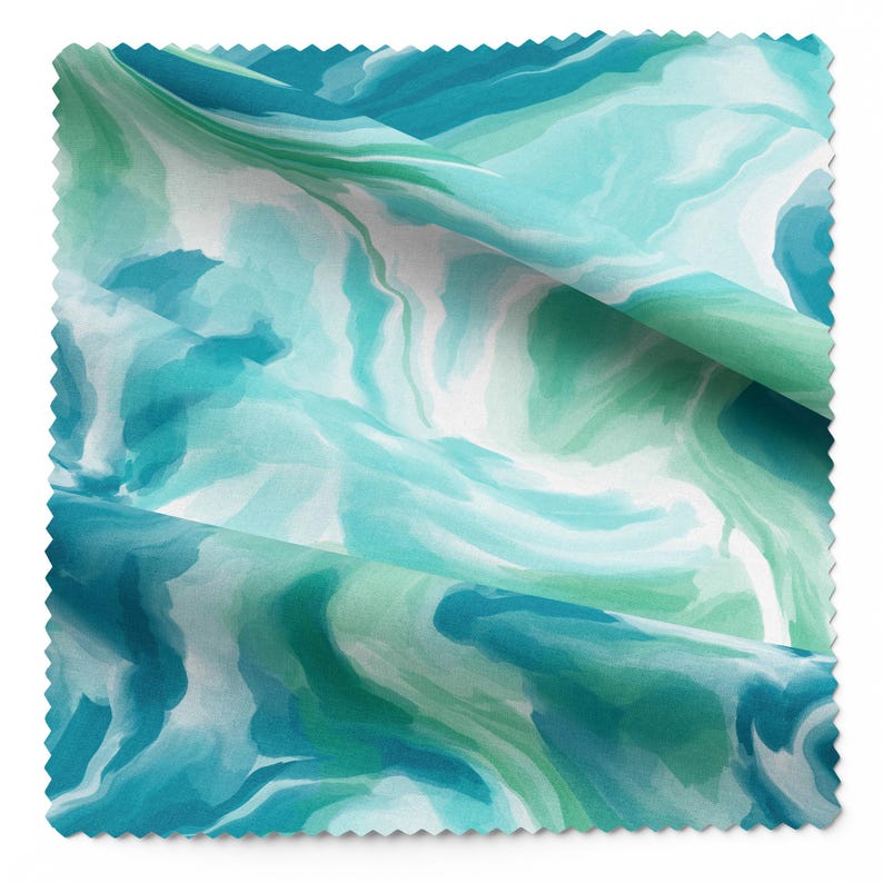 May include: A fabric sample with a watercolour design. The pattern shows swirling shades of teal, turquoise, and white, creating a marbled effect. The fabric is folded, showing the texture and layers of the material.