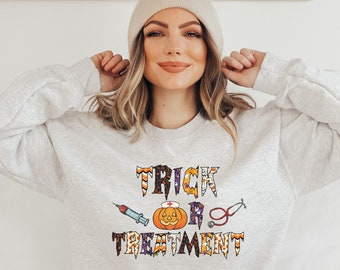 Funny Halloween Nurse Sweatshirt Nurse Halloween Sweater Trick Or Treat Shirt Halloween Nurse Shirts For Women Nurse Sweatshirt For Nurse