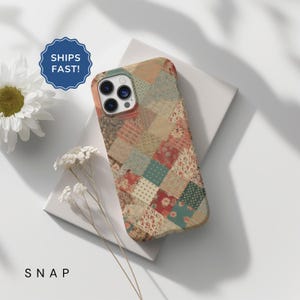 May include: A phone case with a patchwork design featuring various colors and patterns. The case is made of a durable material and has a camera cutout.