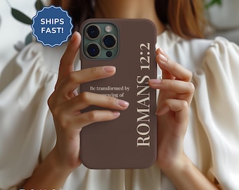 May include: A brown phone case with the text "ROMANS 12:2" and "Be transformed by renewing of" in a vertical layout. The case also has the word "TOUGH" at the bottom. A blue sticker says "SHIPS FAST!"