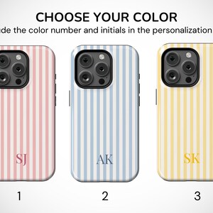May include: Three phone cases with vertical striped patterns in pink, blue, and yellow. Each case has a different set of initials. The text at the top says "CHOOSE YOUR COLOR" and instructs the viewer to include the color number and initials in the personalization box.