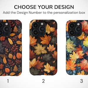May include: Three iPhone cases with different autumn leaf designs. The first case has a dark background with a variety of leaves in shades of orange, brown, and yellow. The second case has a dark background with large maple leaves in shades of orange, yellow, and green. The third case has a blue background with watercolor-style leaves in shades of orange, yellow, and red.
