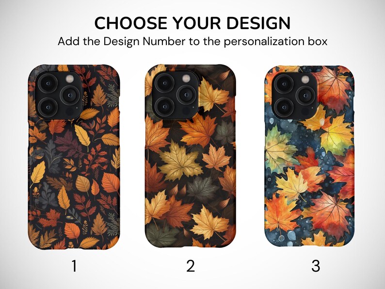 May include: Three iPhone cases with different autumn leaf designs. The first case has a dark background with a variety of leaves in shades of orange, brown, and yellow. The second case has a dark background with large maple leaves in shades of orange, yellow, and green. The third case has a blue background with watercolor-style leaves in shades of orange, yellow, and red.