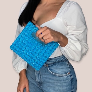 La bolsa de cuentas Cha Mini en turquesa claro