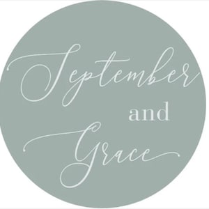 May include: A round, sage green graphic with the words "September and Grace" in elegant white script. The text is centered, creating a clean and stylish design. The overall aesthetic is soft and inviting.