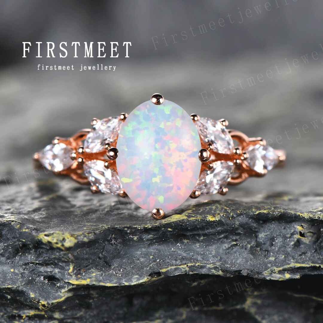Philip Jones Anello regolabile con tre pietre placcato oro creato con cristalli Zircondia
