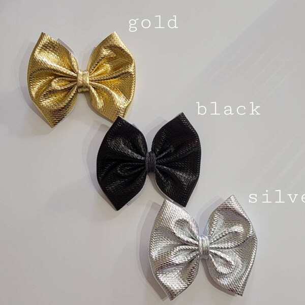 3inch Gold, black or silver metallic bullet fabric hair bow on clip, or on nylon headband.