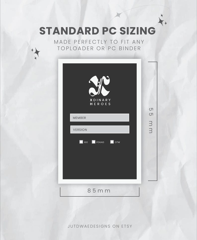 May include: A black and white card with the text "XDINARY HEROES" and fields for "MEMBER" and "VERSION". The card is 85 mm wide and 55 mm tall, designed to fit toploaders or PC binders. Text at the top reads "STANDARD PC SIZING".