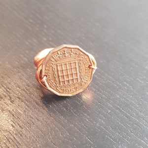 Coin ring England 3 pence 1967 made of wrapped wire
