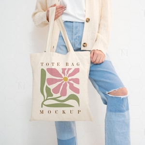 Maquette de sac fourre-tout en toile avec modèle, maquette de sac de célibataire, maquette de sac fourre-tout en coton, maquette de sac à provisions, maquette de sac fourre-tout rétro, photographie