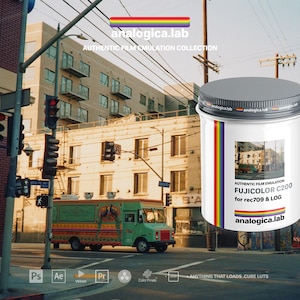 May include: A white cylindrical container with a grey lid featuring the text analogica.lab, Authentic Film Emulation, Fujicolor C200 for rec709 & LOG, and a rainbow stripe. The container displays a small image of a street scene with a food truck.
