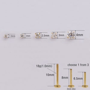 May include: A set of five clear cubic zirconia nose rings in different sizes, ranging from 1.5mm to 4mm. The rings are made of 18 gauge (1.0mm) gold and come with a choice of three different lengths: 6.5mm, 8mm, and 10mm.