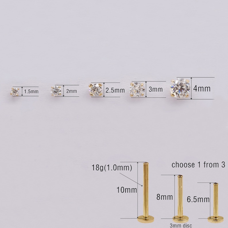 May include: A set of five clear cubic zirconia nose rings in different sizes, ranging from 1.5mm to 4mm. The rings are made of 18 gauge (1.0mm) gold and come with a choice of three different lengths: 6.5mm, 8mm, and 10mm.