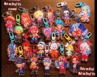 May include: A collection of twenty-two acrylic keychains featuring colorful anime-style character illustrations, each attached to a plastic lobster clasp. The text "Only on Etsy! Not on Etsy? It's a scam!" is printed in the corners of the image.
