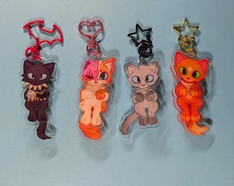 Warrior battle cats inspired swinging scourge fire star ash fur bright heart keychain