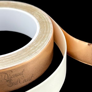 May include: Roll of copper tape with a white adhesive backing. The tape is partially unrolled, revealing the copper surface. The tape is labeled "Discount 3rd Coast".