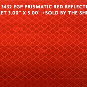 May include: A sheet of 3M 3432 EGP prismatic red reflective material. The sheet measures 3.00 inches by 5.00 inches. The text "SOLD BY THE SHEET" is printed on the sheet.