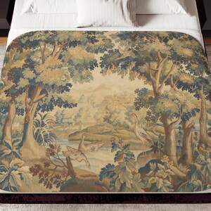 May include: A bedspread featuring a pastoral landscape scene with trees, water, and birds. The color palette includes shades of green, blue, and beige, creating a vintage aesthetic. The bedspread is placed on a bed with a burgundy headboard.