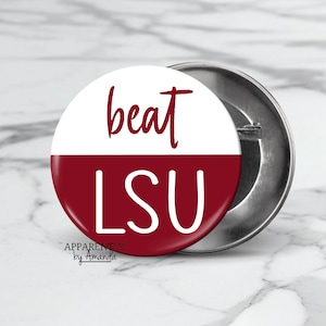 May include: A white ceramic mug with a colorful floral design. The mug features a handle and is likely used for hot beverages. The floral pattern includes various flowers and leaves.