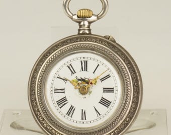 Reloj de bolsillo suizo de plata maciza en funcionamiento, reloj antiguo de cuerda manual para mujer.