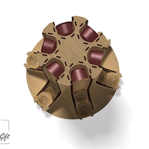 May include: A wooden rotating stand with six slots for coffee pods. The stand is made of light brown wood and has a circular base. The coffee pods are arranged in a circle around the stand. The stand is labelled "Caffeina" and "Espresso".