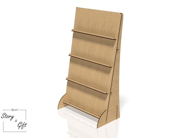 May include: A wooden magazine rack with four shelves. The rack is made of light brown wood and has a slightly angled design.