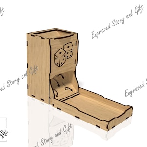 Peut inclure: Une tour à dés en bois avec un plateau, avec des symboles de dés gravés et le texte "Engraved Story and Gift". La tour a une fente pour lancer les dés et un plateau pour les attraper.