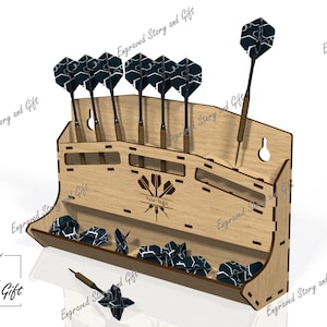 May include: A light-coloured wooden dart display rack featuring slots for six darts and a lower tray for accessories. The centre of the rack is engraved with a dart graphic and the text "Your logo". Several black and white patterned dart flights are stored in the tray.