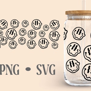 May include: A clear glass tumbler with a wooden lid and a straw. The tumbler is decorated with a repeating pattern of black and white smiley faces with wavy lines.