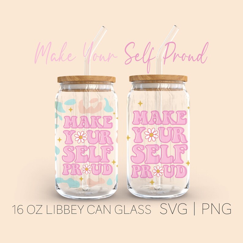 May include: Two 16 ounce glass jars with wooden lids and pink straws. The jars have a design with the text "Make Your Self Proud" in pink letters with a daisy in the "O" of "Your".