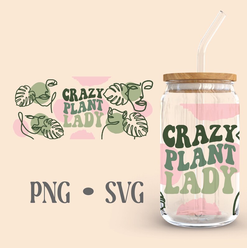 May include: A clear glass jar with a wooden lid and a straw. The jar has a pink and green design with the text "CRAZY PLANT LADY" in green letters. The design also includes abstract line drawings of faces and leaves.