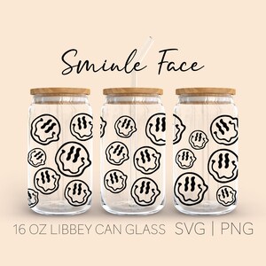 May include: Three 16 ounce glass jars with wooden lids and a black and white smiley face pattern. The text "Sminkle Face" is at the top of the image.