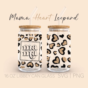 May include: Two 16 ounce glass can cups with wooden lids and clear straws. The cups are decorated with a brown and black heart leopard print. One cup has the word "mama" in a retro font inside a square on the front.
