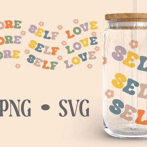 May include: A clear glass water bottle with a wooden lid and a straw. The bottle has a colorful design with the words "SELF" repeated multiple times. The design also includes small flower graphics.