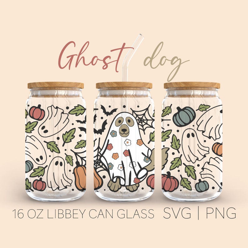 May include: Three 16 oz glass jars with wooden lids and a straw. The jars are decorated with a Halloween theme featuring ghosts, pumpkins, bats, and leaves. The middle jar features a ghost dog with a floral pattern.