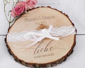 Engraved tree disc as a ring pillow for a wedding