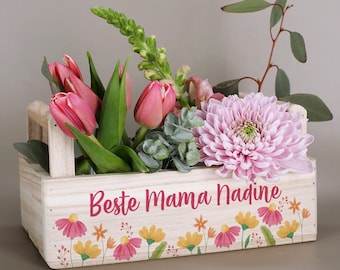 Boîte à plantes avec texte souhaité et motif floral