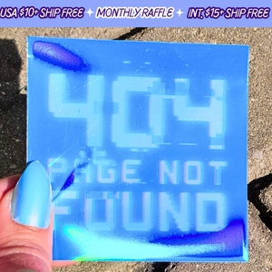 May include: A blue iridescent sticker with the text "404 PAGE NOT FOUND" in a pixelated font.
