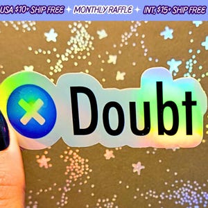 May include: A holographic sticker with the word "Doubt" in black text and a blue and white X symbol. The sticker has a rainbow iridescent finish.