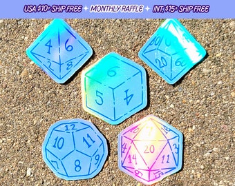 May include: Five iridescent holographic stickers of different shaped dice with blue outlines and black numbers. The dice are a d4, d6, d8, d10, and d20.