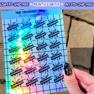 May include: A sheet of holographic stickers with a grid pattern. Each sticker has a pixelated image with the word "CENSORED" printed in black text. The sheet is labeled "THE CENSORED" and "@THE STICKERALCHEMIST".