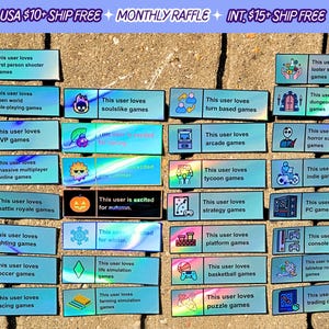 May include: A collection of 20 blue and iridescent stickers with different game genres and icons. Each sticker has text that reads "This user loves" followed by the game genre. The text "USA $10+ SHIP FREE MONTHLY RAFFLE INT. $15+ SHIP FREE" is at the top of the image.