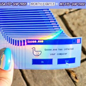 May include: A stack of iridescent holographic stickers featuring a blue and white computer error message with the text "Goose.exe has infected your computer". The message has two buttons: "Ok" and "Run". A goose icon is in the top left corner of the message.