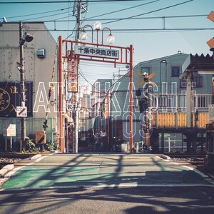 May include: A rustic wooden sign with the text "Welcome to our home" in white lettering. The sign features a distressed finish and a simple, inviting design, perfect for entryway decor.