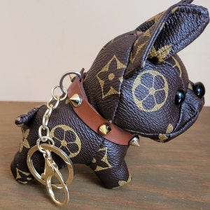 Louis Vuitton K9 puppy dog keychains Review!!!! One of a kind item