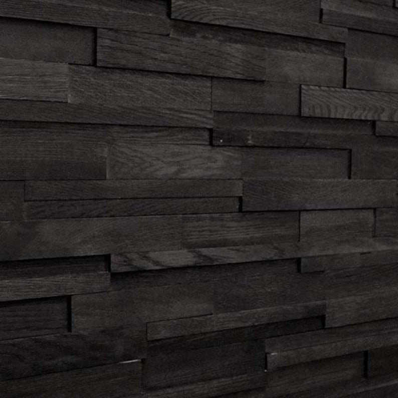May include: Black wood wall paneling with a staggered, overlapping design. The wood planks are arranged in a horizontal pattern, creating a textured and modern look.