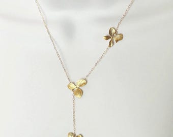 Collar tipo lariat de orquídea chapado en oro y relleno de oro: ajustable. Cascada floral.